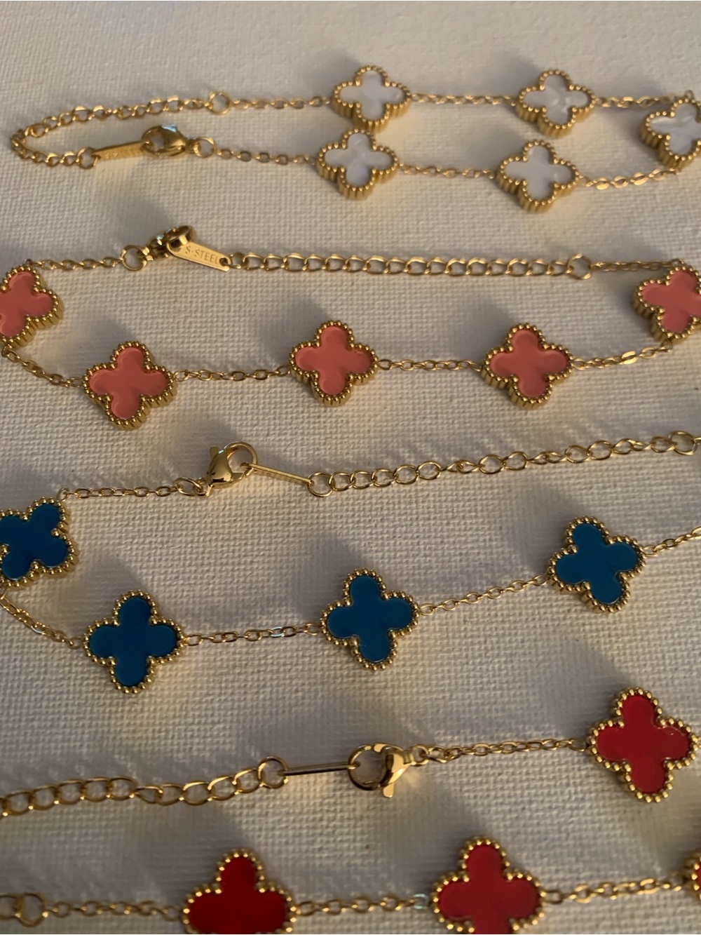 Set of 4 - Gold Clover Link Bracelet with Pink, Blue, Red and White Enamel